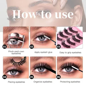 Thick black false eyelashes set with application guide steps on a pink tray and tools