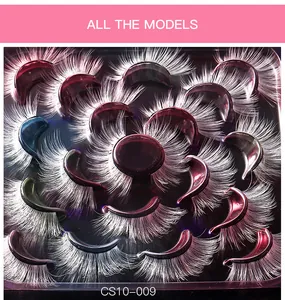 Macro shot of 10 pairs of dense white synthetic fiber false eyelashes in a display tray