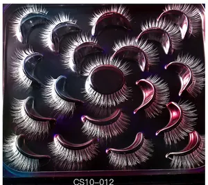 Detailed top view of 10 pairs of dense black faux lashes in symmetric tray layout