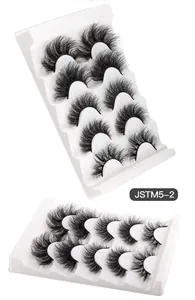 Detailed side view of 5 pairs of fluffy, multi-layered faux mink eyelashes in model JSTM5-2