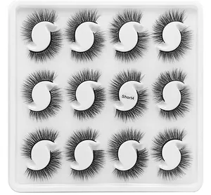 Detailed view of 12 pairs of dense multi-layered synthetic eyelashes in Short4 style