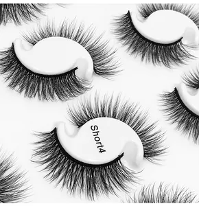 Macro shot of Short4 dense black synthetic fiber false eyelashes on S-shaped white holders