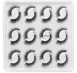 Detailed macro view of 12 pairs of dense crisscross synthetic fiber lashes in Short5 style