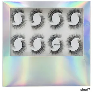 Detailed macro view of 8 pairs of multi-layered thick false eyelashes in holographic packaging
