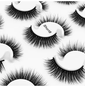 Macro shot of 12 pairs of dense multi-layer false eyelashes in Short8 natural black style