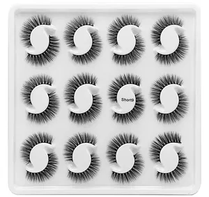 Detailed top view of 12 pairs of natural thick synthetic eyelashes in model Short9