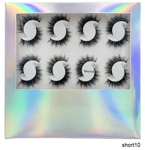 Close-up of Short10 dense layered false eyelashes in a holographic display box