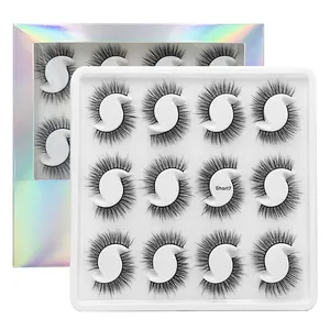 12 pairs of natural dense black false eyelashes set in a holographic iridescent display box