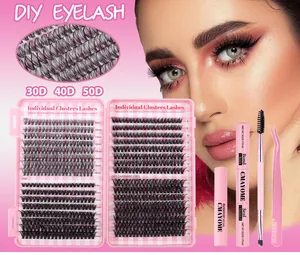 Detail of DIY eyelash cluster kit with bond, seal, remover, and tweezers in pink packaging