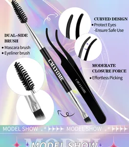 Detail of dual-ended makeup brush and black tweezers tool set for eyelash application