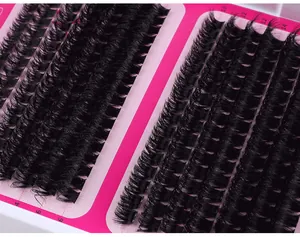 Detaillierte Makroansicht verschiedener Längen von DIY-Cluster-Wimpern in einem Tray