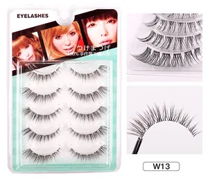 Macro detail of 5 pairs of natural thick false eyelashes with clear fishing line band
