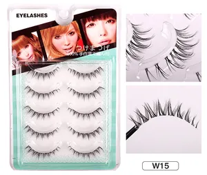 Close-up of 10 pairs of clear band manga eyelashes with natural criss-cross style details