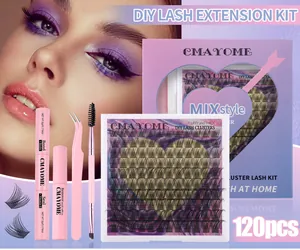 Macro shot of fluffy DIY eyelash extension kit including bond, seal, and pink tweezers