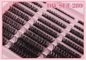 Macro view of 280 clusters of dense black DIY segmented eyelashes in a pink tray