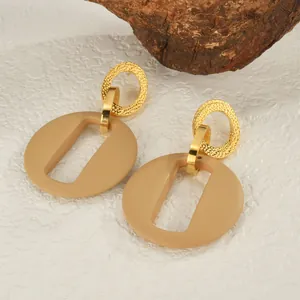 Boucles d'oreilles géométriques en acrylique et acier inoxydable doré avec anneaux ovales