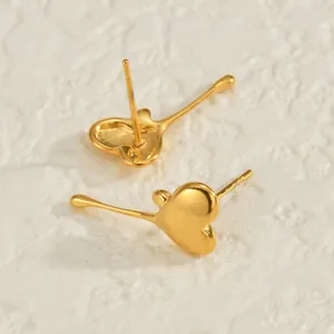 Polished 18K gold plated lava heart stud earrings featuring minimalist asymmetric design