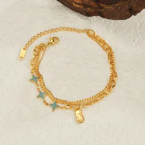 Gold multi-layer stainless steel bracelet featuring blue star charms and engraved star tag