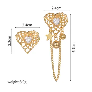 Detailed dimensions of gold asymmetrical heart earrings with crystal and tassels