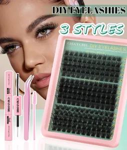 DIY eyelash extension kit with glue, tweezers, and three styles of dense cluster lashes
