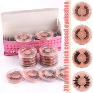 Detail view of 20 pairs of 3D thick crossed false eyelashes in pink glitter packaging