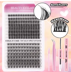 Detail of DIY lash extension kit with C-curl clusters, bond, seal, and pink tools