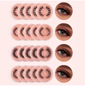 Detailed grid of voluminous black false eyelashes in pink glitter boxes with eye effect