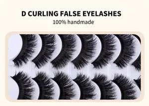 Macro shot of 10 pairs of dense D-curl false eyelashes arranged in a white display tray