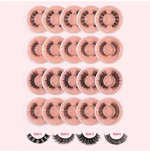 Detail view of 20 pairs of false eyelashes in four distinct styles on pink glitter trays