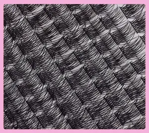 Macro view of C-curl individual eyelash clusters with natural density and fine texture