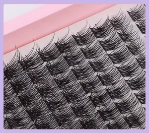 Macro shot of dense individual lash clusters showing natural C-curl synthetic fiber texture