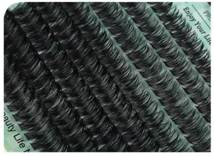 Macro detail of individual cluster eyelashes in tiered arrangement with natural curl
