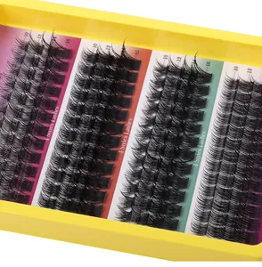 Macro detail of individual eyelash extension clusters in 10-16mm lengths on yellow tray