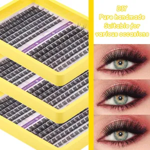 Macro view of D curl DIY lash clusters with natural volume shown in yellow tray