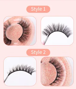Detail view of Style 1 and 2 natural curled eyelashes in a pink glitter storage case