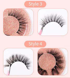 Detailed close-up of dense natural curly false eyelashes in pink storage case