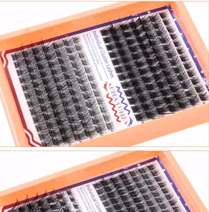 Detail view of cluster lashes showing various lengths from 8mm to 16mm in orange tray