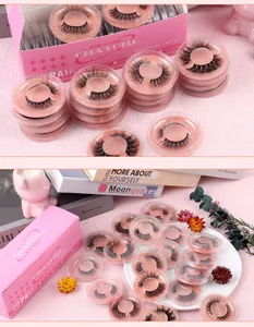 Detail of 20 pairs of 3D false eyelashes in individual round cases with pink packaging