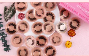 Macro detail of reusable waterproof false eyelashes in a pink glitter storage case