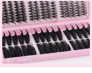 Macro shot of 540 clusters of thick D-curl eyelashes in pink storage box packaging