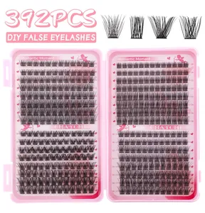 Detail van 392st DIY clusterwimpers set met diverse lengtes in een roze displaydoos