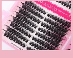 Macro detail of natural dense cluster eyelashes with heat-bonded base on pink tray
