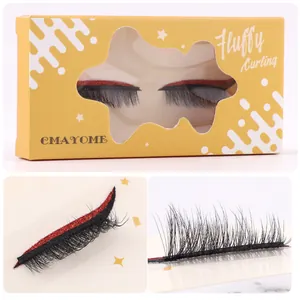 Pair of fluffy black false eyelashes with red glitter eyeliner on yellow packaging