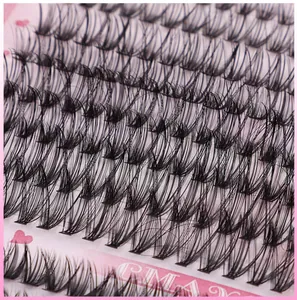 Macro view of dense rows of natural curled black synthetic DIY lash extensions
