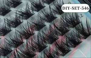 Λεπτομέρεια macro από 144 τούφες DIY βλεφαρίδες με 12mm D-curl και φυσικό όγκο χιαστί