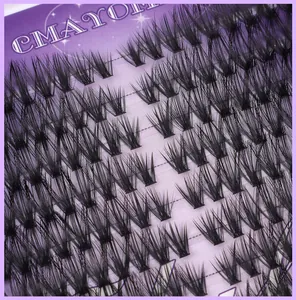 Macro detail of D-curl cluster lashes with fine fiber texture on purple packaging