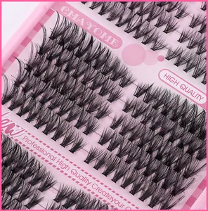 Detail of wispy individual cluster eyelashes with natural D curl on pink backing card