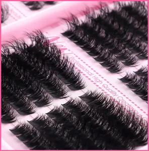 Macro detail of dense D-curl individual false eyelashes on pink tray for professional makeup
