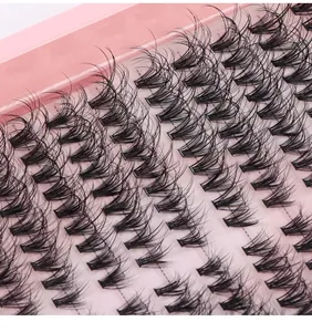 Macro shot of 216 clusters D-curl individual lashes on pink tray for DIY eyelash extension