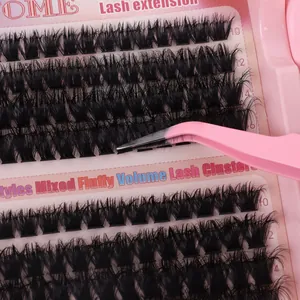 Detail of OMLIE fluffy volume lash clusters with pink tweezers in a multi-size set
